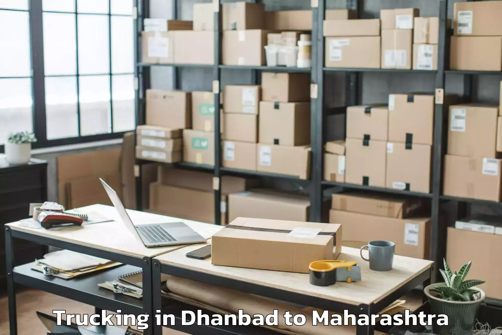 Easy Dhanbad to Shevgaon Trucking Booking